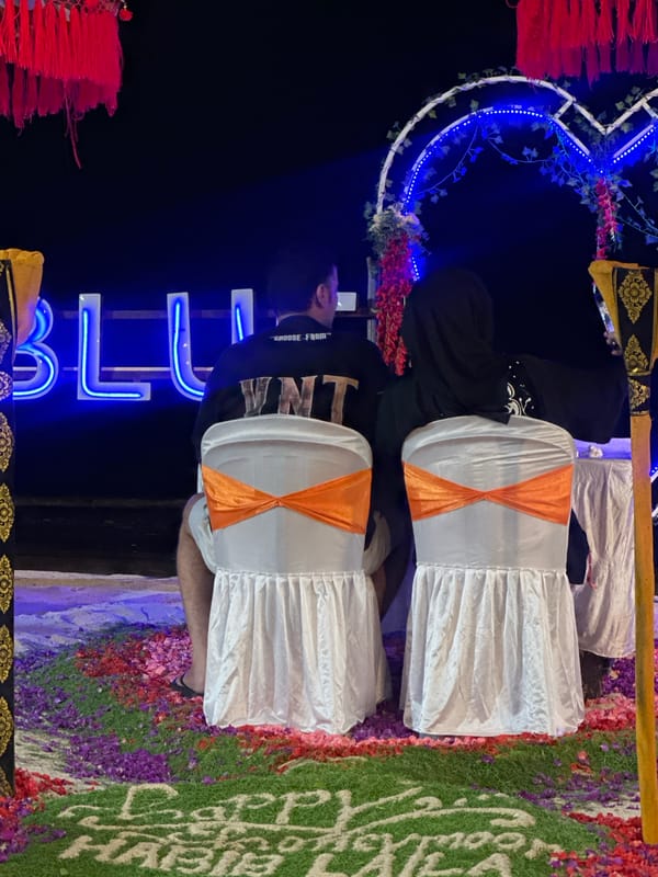 Tourists gather for beachside dining and photos at Kuta Beach
