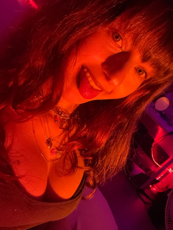 Woman poses with Steinbeck book during hour-long selfie session
