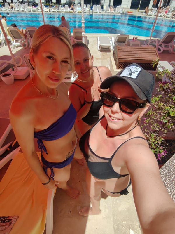 Women enjoy morning poolside activities at Alanya resort