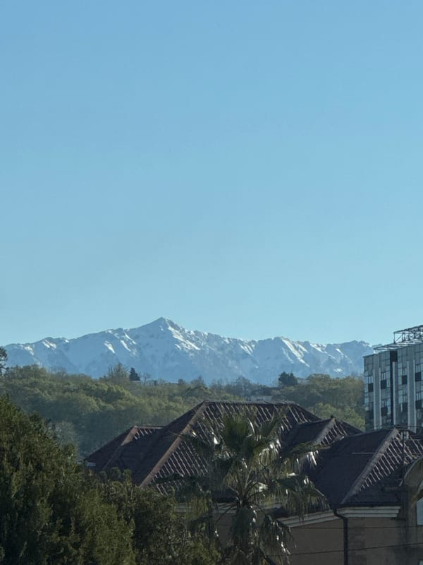 Clear skies and snow-capped peaks captured in Sirius, Russia