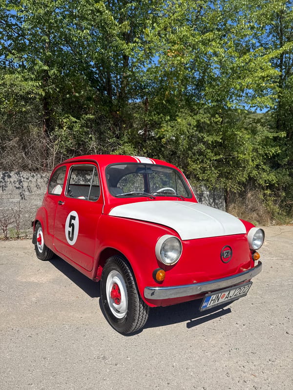 Racing-liveried vintage Fiat 600 parked in Montenegro