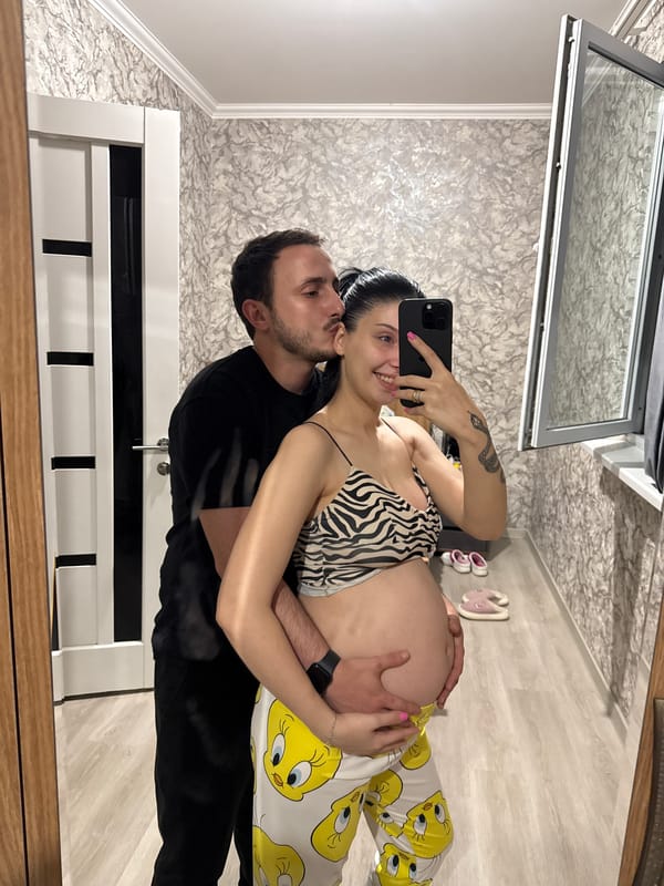 Couple marks a pregnancy milestone at home in Tbilisi