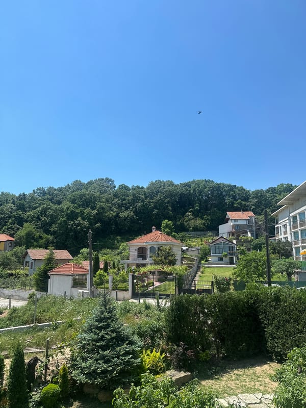 Hillside homes with red roofs captured in Varna, Bulgaria