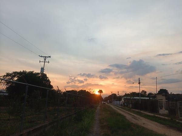 Sunset observed along rural dirt road in Tinaquillo, Venezuela