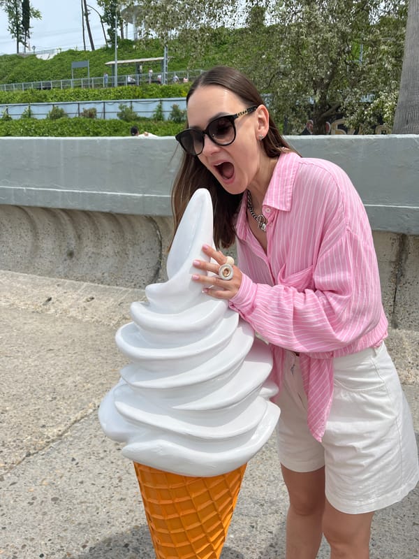 Beach day at Sochi's pebbled shores with ice cream sculpture