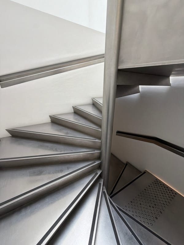 Modern spiral staircase photographed from above in Paris