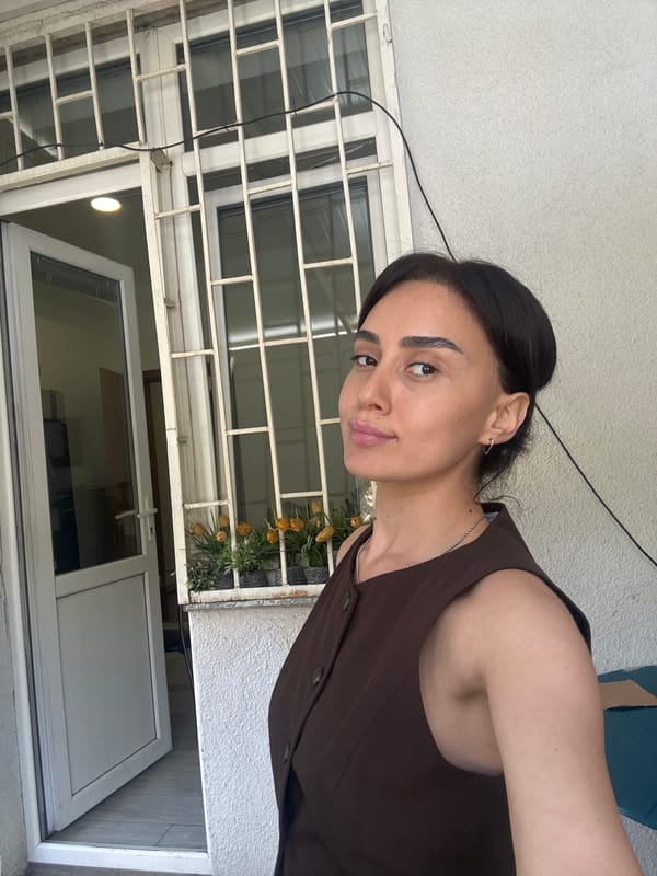 Quick selfie session across a Tbilisi café and balcony