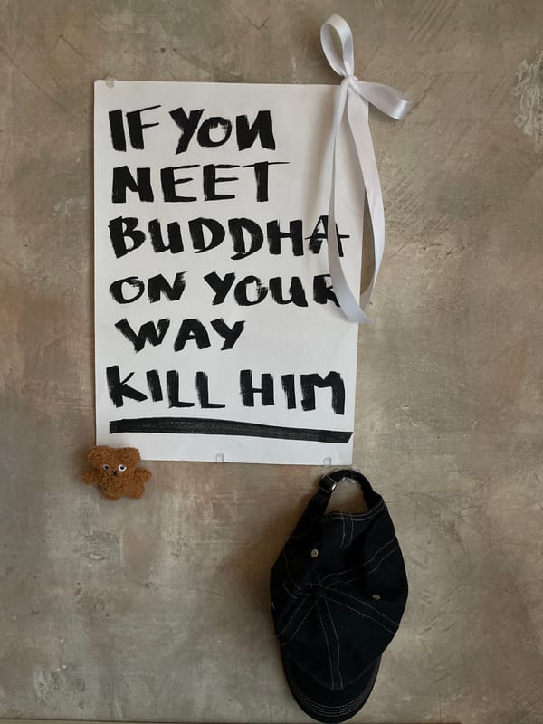 Buddhist Koan Banner and Art Book Displayed Indoors