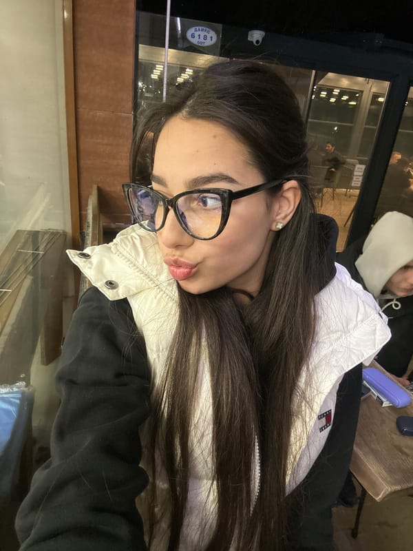 Woman takes selfies in Tommy Jeans jacket in Plovdiv