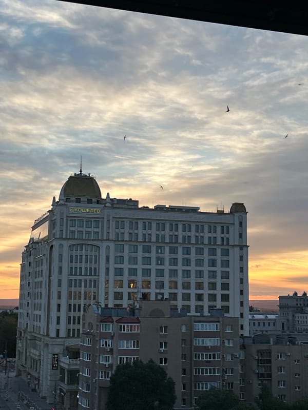 Sunset evening along the Novokuybyshevsk riverside and rooftops