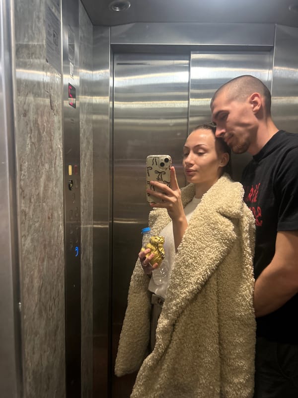 Couple takes selfie in elevator in Burgas, Bulgaria