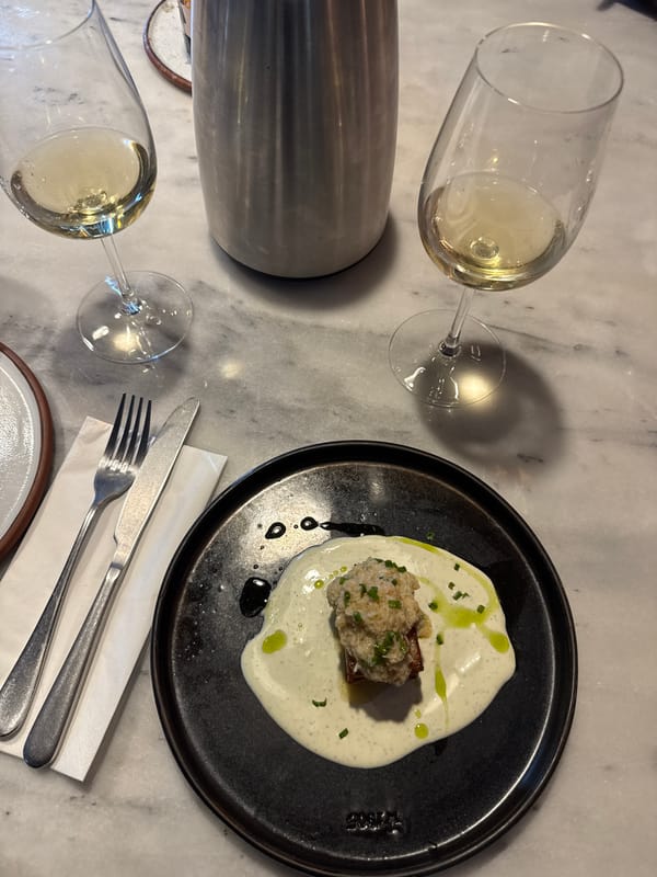 Wine glasses observed on marble table in London restaurant