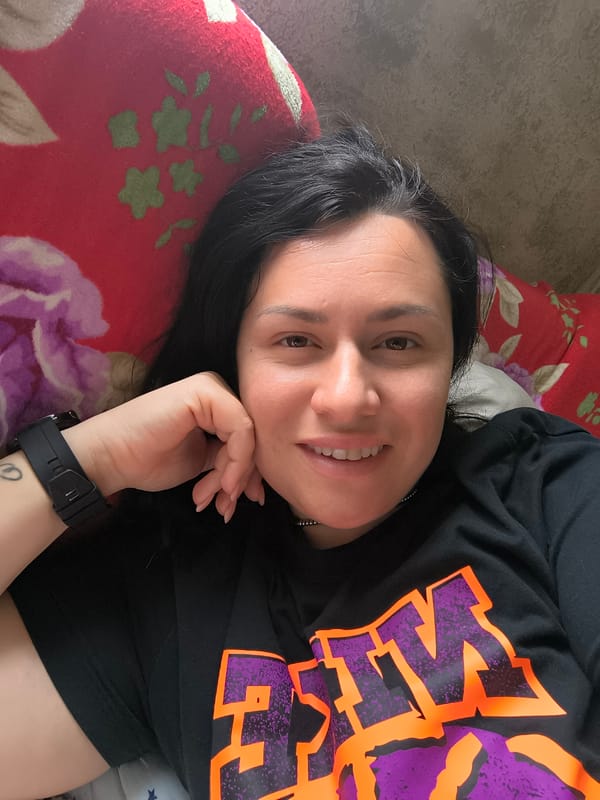 Woman takes selfie on floral pillow in Pleven