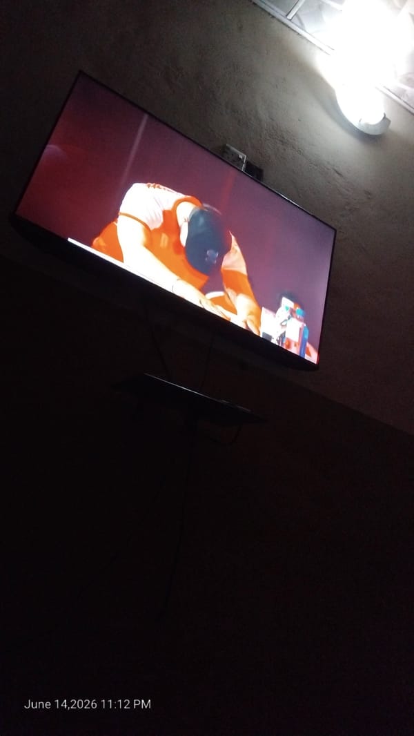 Evening TV viewing session in Nigerian living room