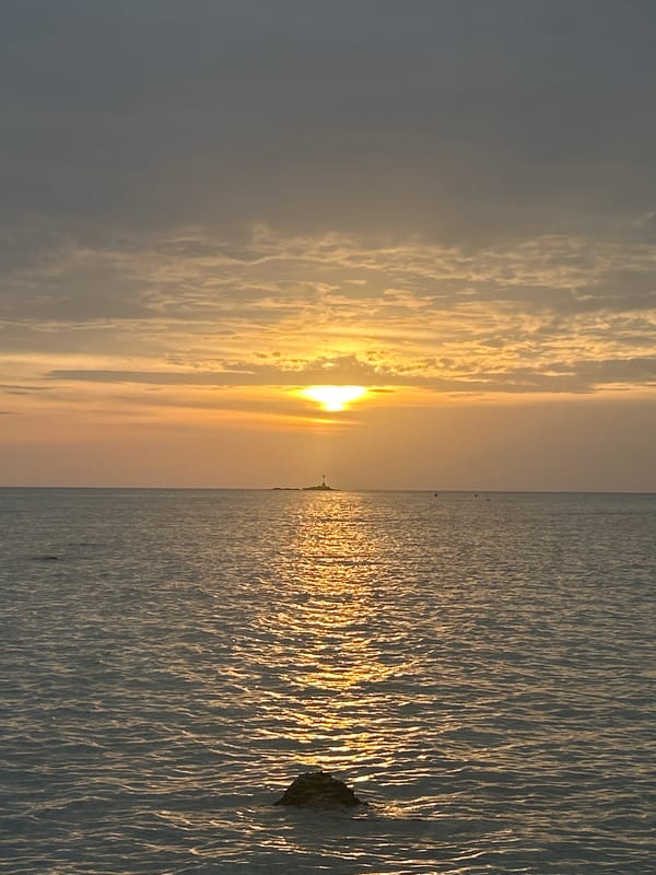 Ko Pha-ngan beach life: fishing, soccer, and a hazy shoreline