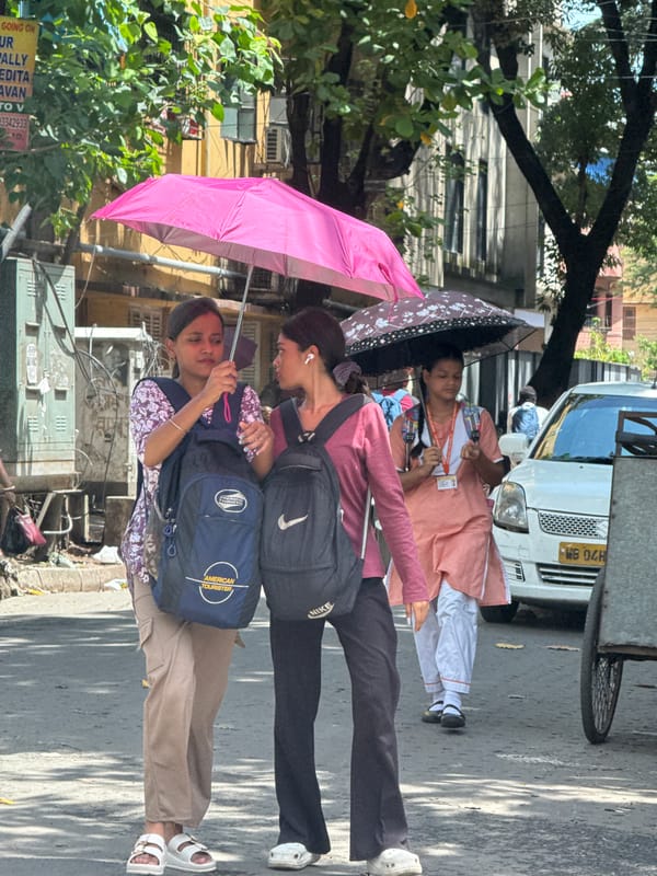 Street-level moments in Kolkata on a sunny afternoon
