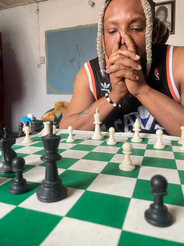Chess match observed in Jos, Nigeria between casual players