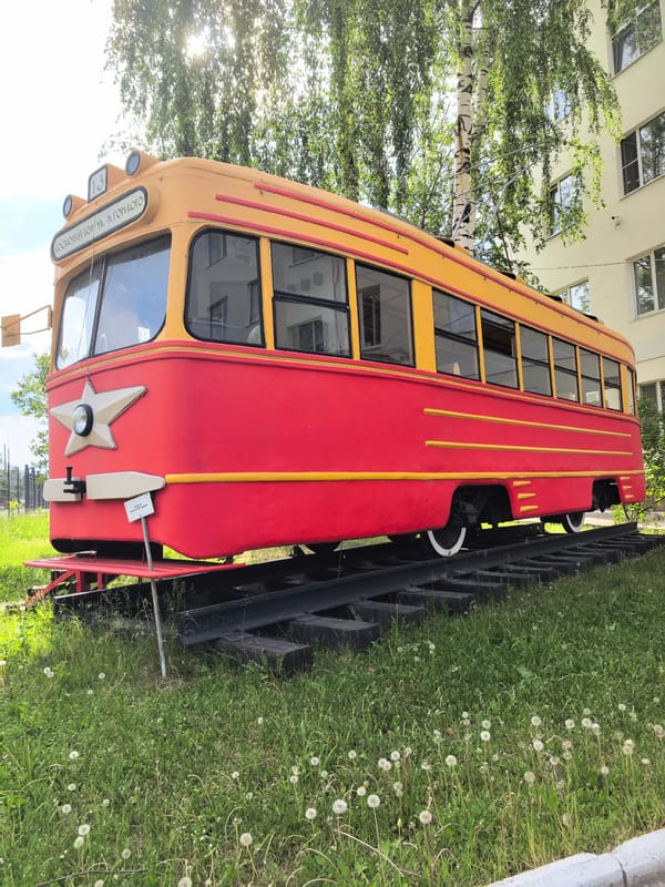 Urban scenes with vintage tram monument and playful moments documented