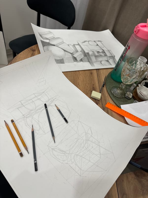 Artist's workspace with geometric sketches documented in Kazan