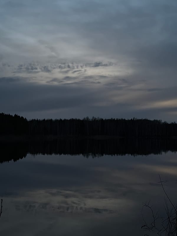 Serene twilight waterscape photographed in Novyi, Russia