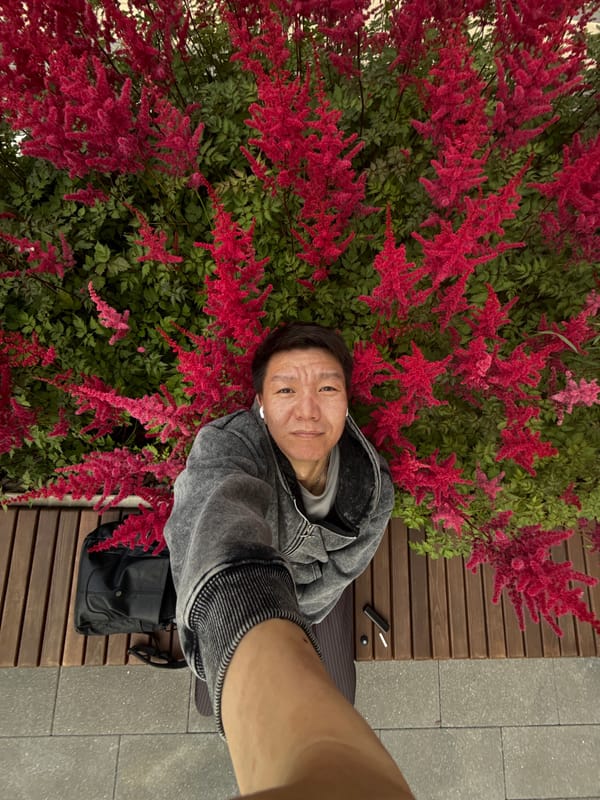 Quick selfie break among Moscow's summer garden flowers