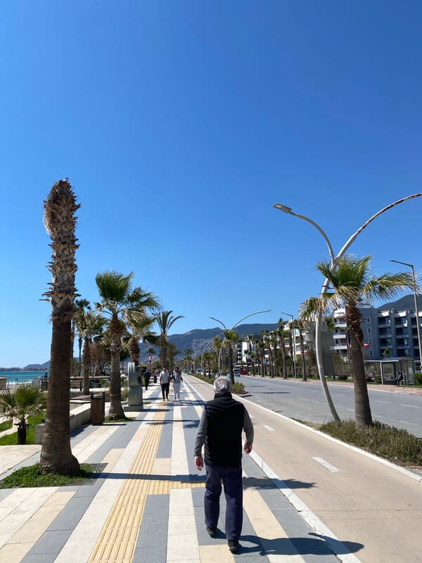Tourist captures casual street scenes during morning walk in Alanya