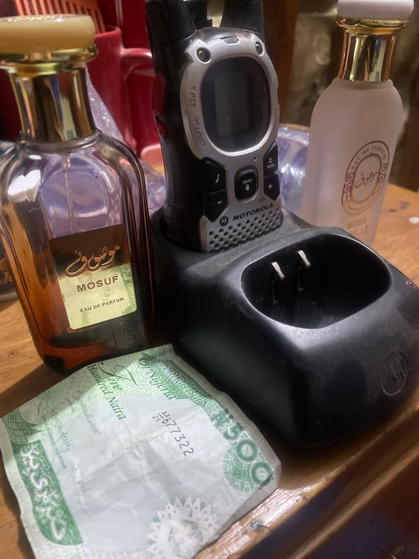 Cash and jewelry laid out on a table in Jos, Nigeria
