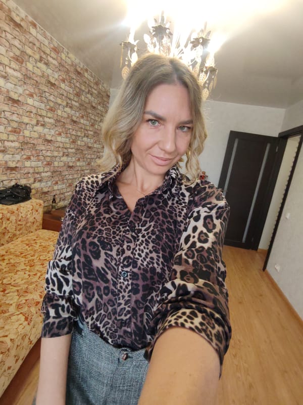 Woman takes selfies at home in Petropavlovsk-Kamchatsky