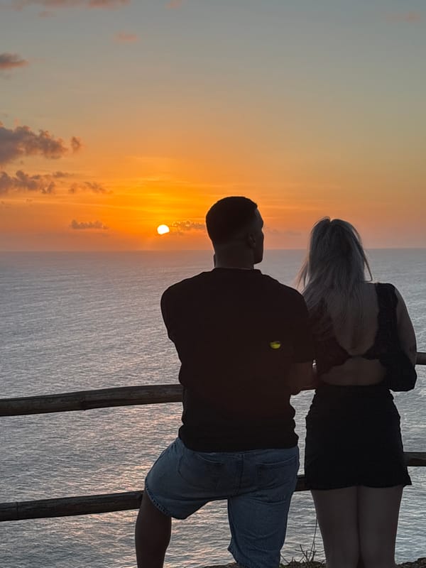 Crowd gathers at Kuta Selatan cliff for sunset views