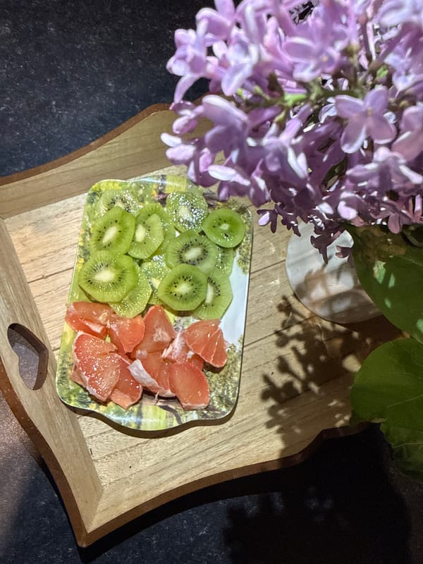 Resident documents indoor fruit and flower arrangements in Great Yarmouth