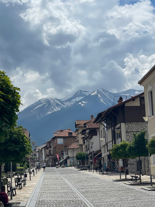 Mountain views documented in Bulgarian town under cloudy skies