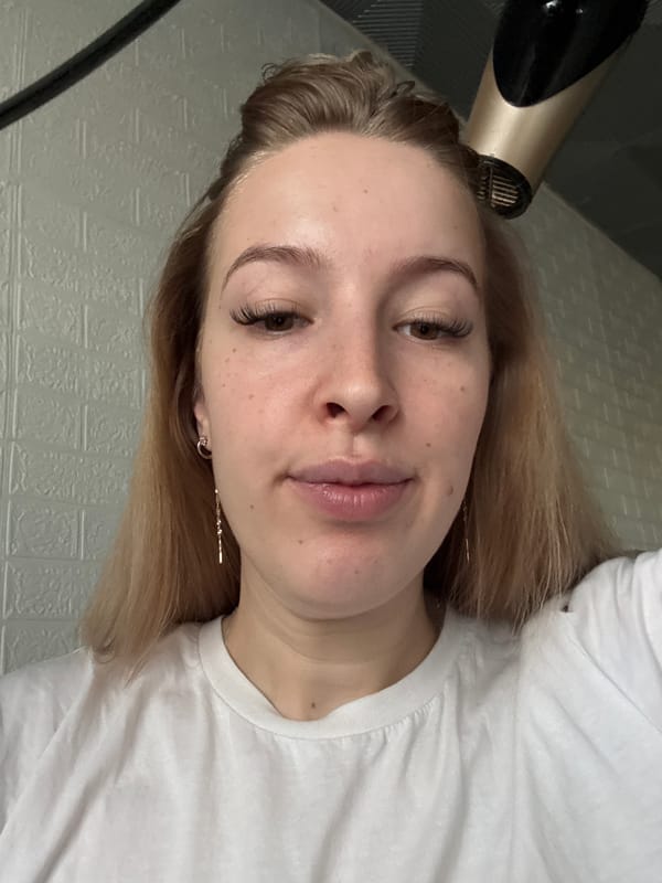 Morning portraits captured in Donetsk show woman and cat