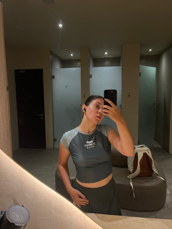 Woman takes selfie in North Kuta locker room