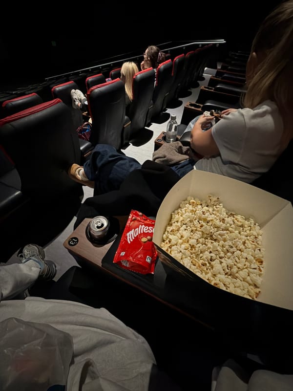 Moviegoers settle into London cinema for evening screening