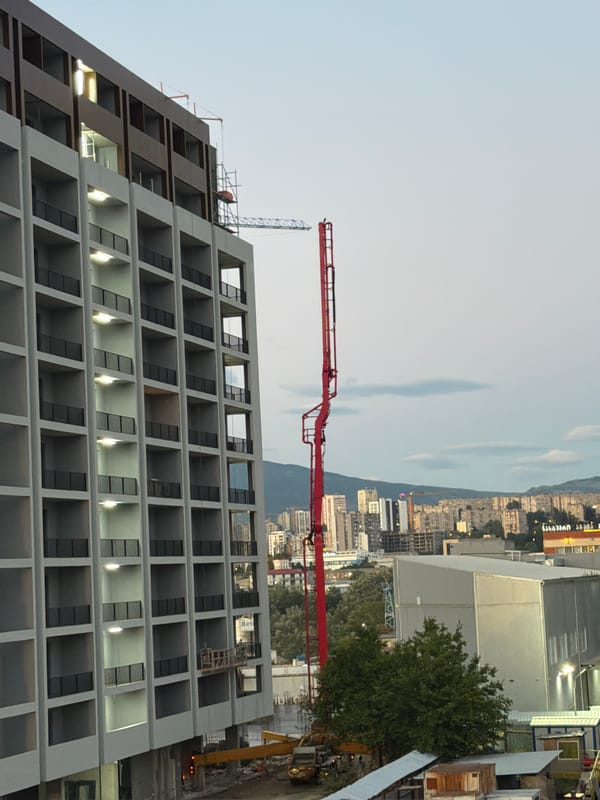 Tbilisi construction site and kids' soccer session, late afternoon