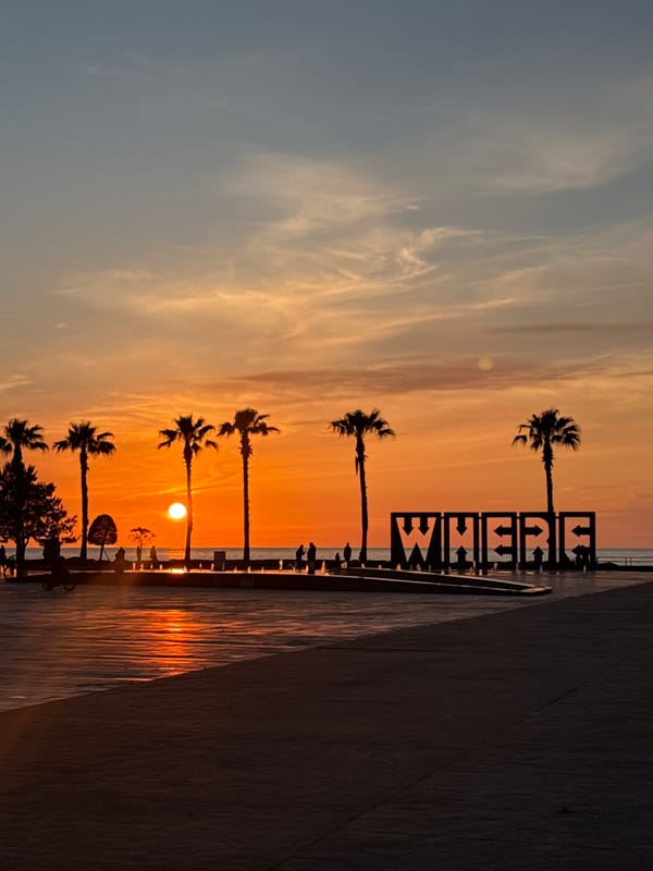 Vibrant sunset documented over Batumi coastal promenade