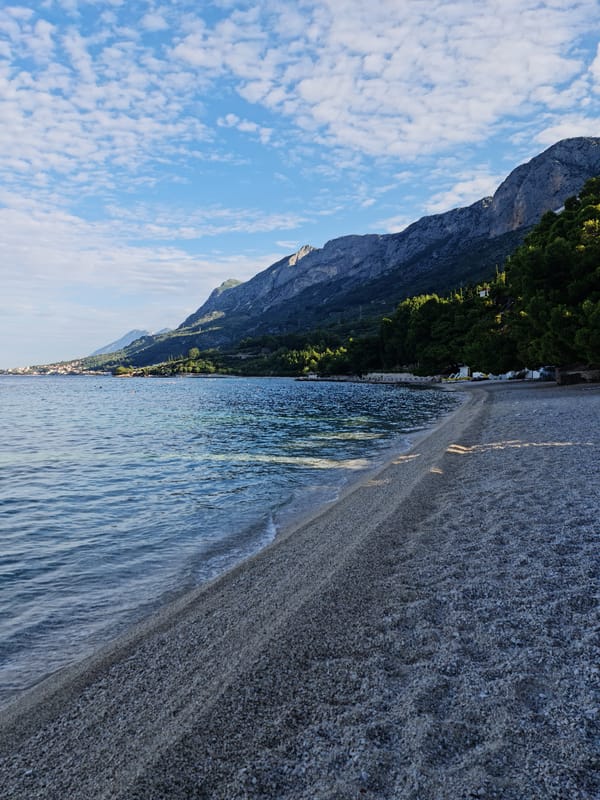 Pebble beach morning on the Dalmatian coast, Općina Gradac