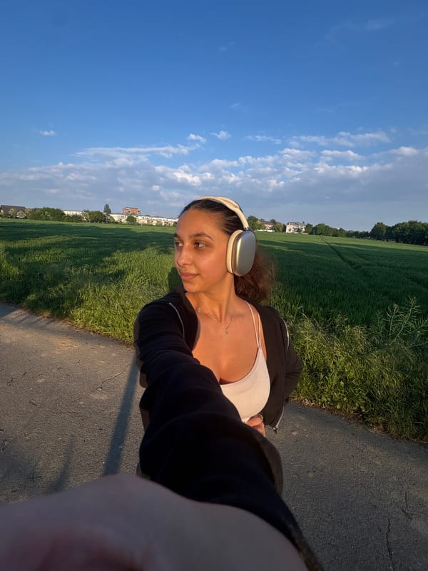 Young woman documents evening walk through Mönchengladbach streets