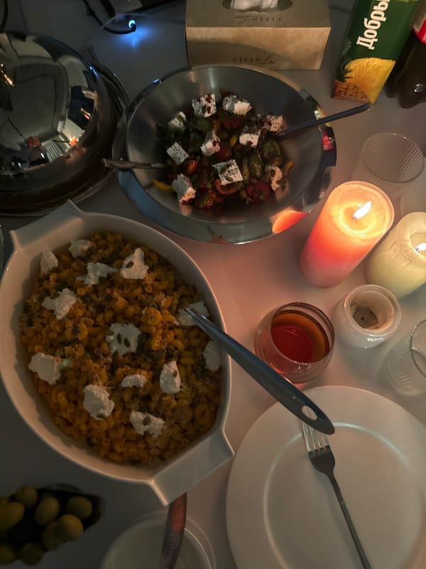 Candlelit dinner with pasta, salad served in Yerevan residence