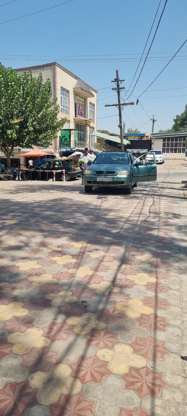 Sunny morning street scene, Ismoili Somoni, Tajikistan