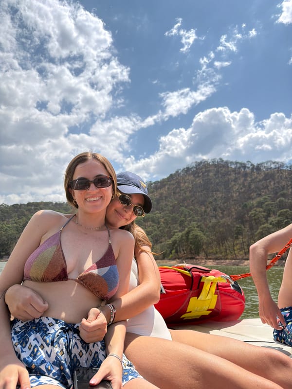 Friends take selfies while boating on Lake Avándaro