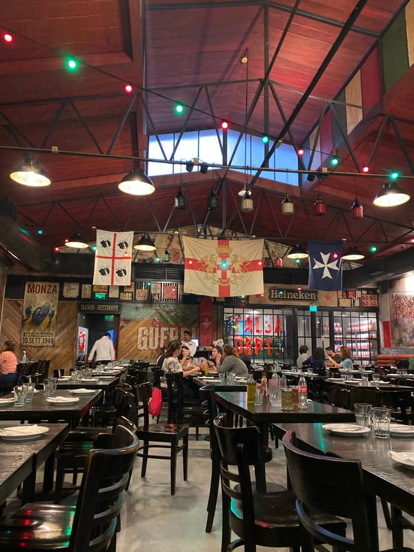 Rainy evening dining and street scenes on Buenos Aires' Corrientes