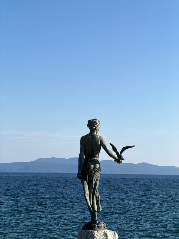 Tourist captures scenic moments around Opatija's harbor and promenade
