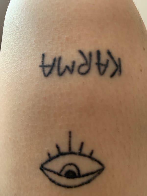 Personal moments: tattoo, soup, and cat documented Sunday afternoon