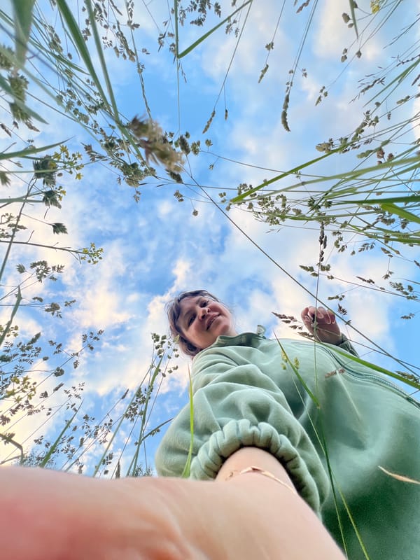Woman Documents Summer Day in Russian Countryside