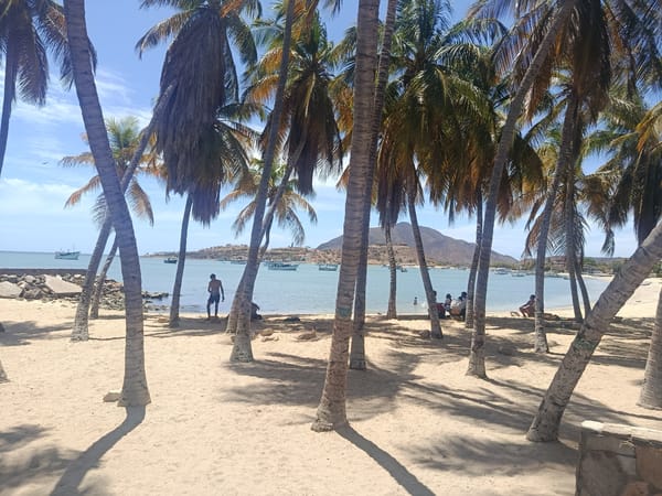 Witness documents sunny afternoon coastal scenes in Juan Griego, Venezuela