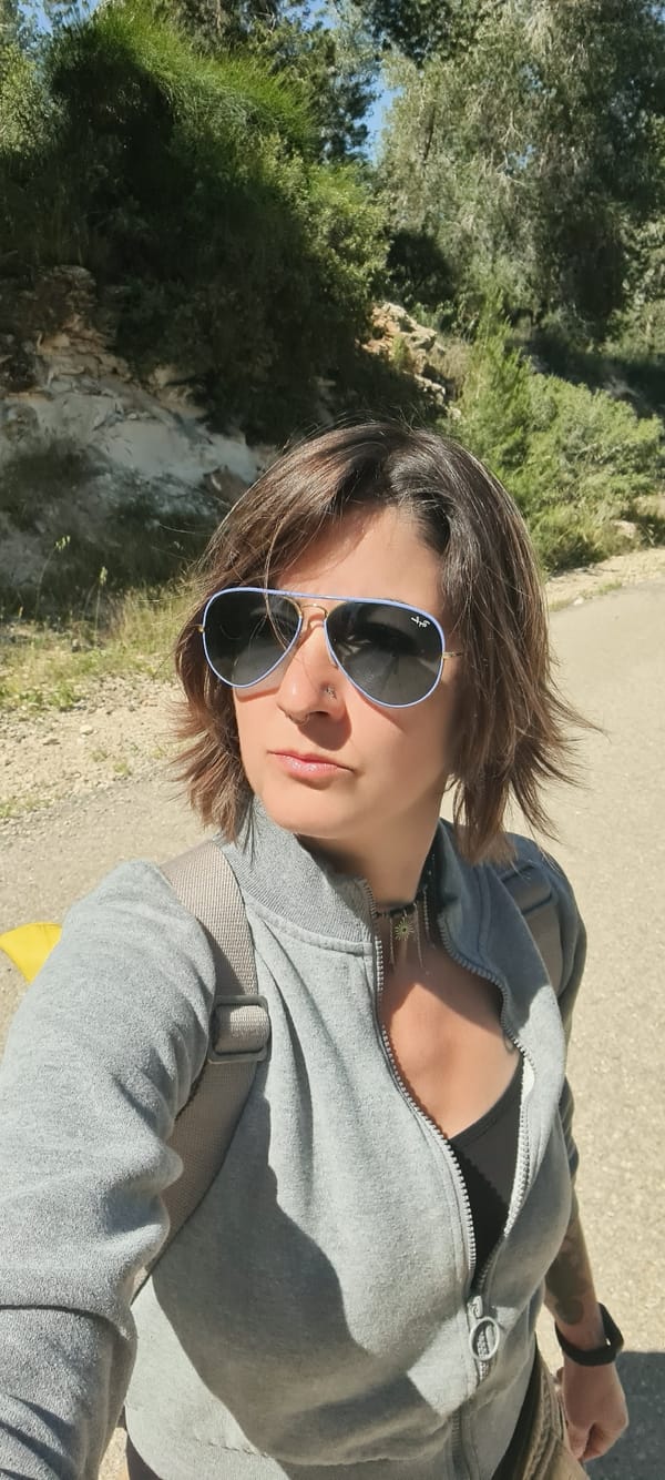 Woman photographed hiking near security fence in rural Israel