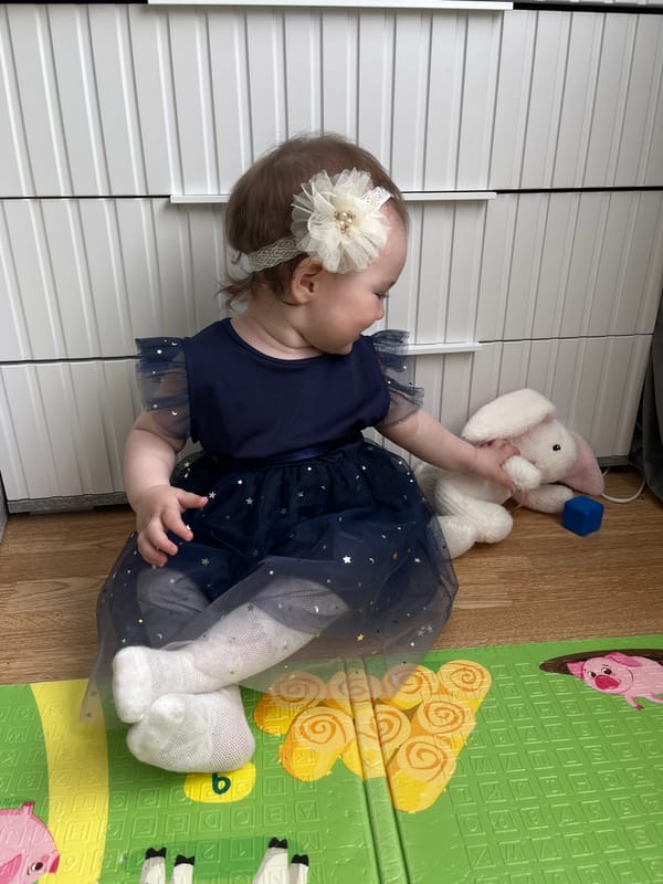 Toddler's playtime documented in two outfits in Shushary, Russia