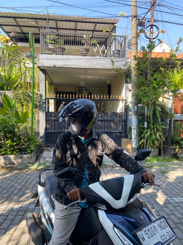 Mixed scenes from Gelam: selfies, card games, motorcycle break