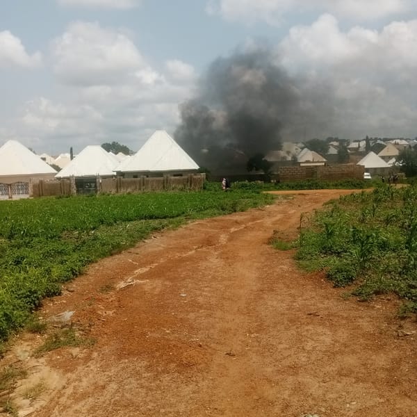 Residential fire burns in Akwanga, Nigeria, smoke visible across neighborhood